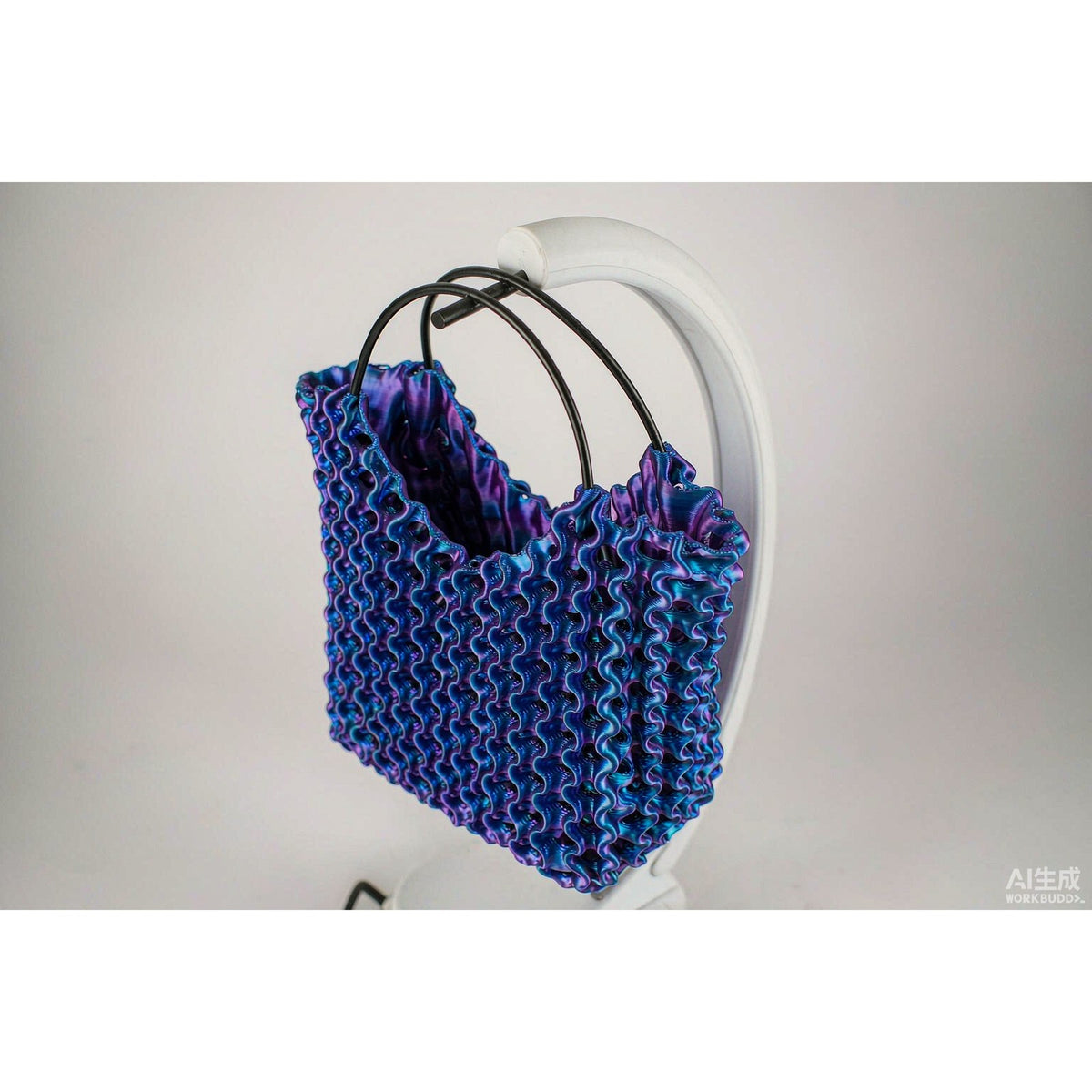 PRISM TOTE photographed from above showing the open lattice walls and interior
